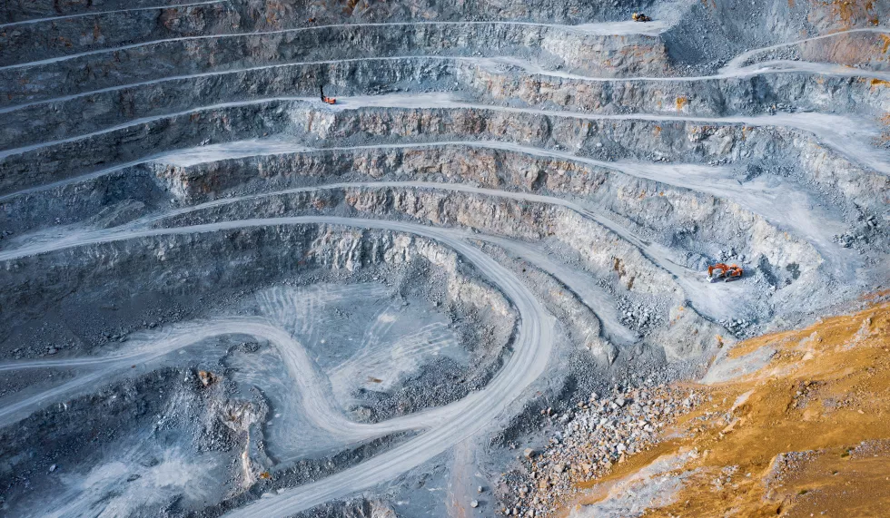 open-pit-stone-quarry-aerial-view-with-terraces-colorful-tailings