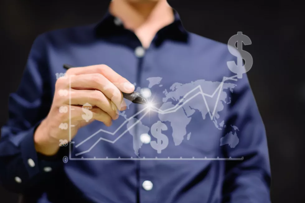 business-people-display-graphs-trading-money-around-world