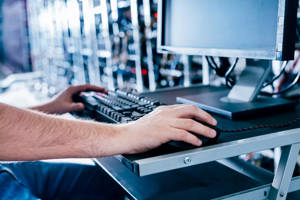 it-specialist-working-bitcoin-crypto-currency-mining-farm(1)