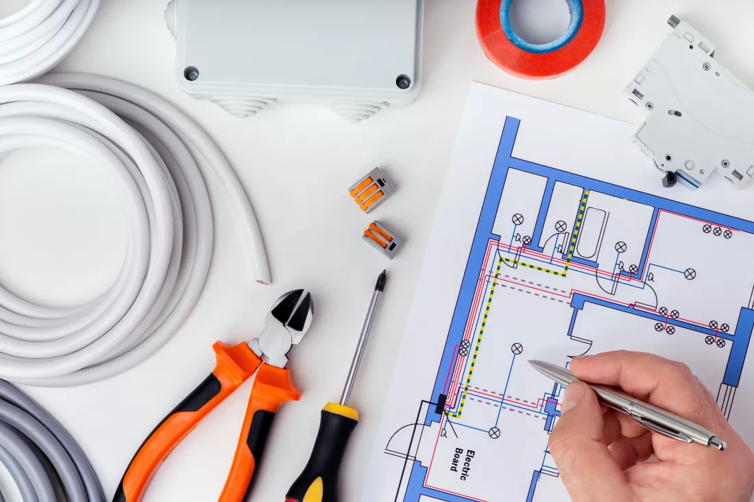 electrician-checking-electrical-plans-concept-repair-electrical-equipment