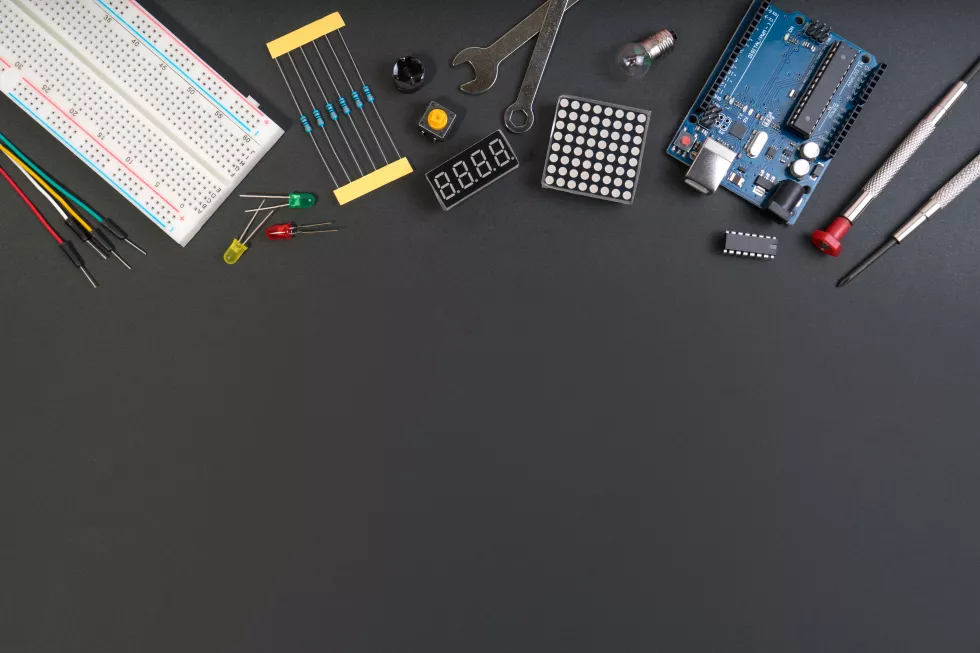 diy-electronic-maker-tools-components-black-background