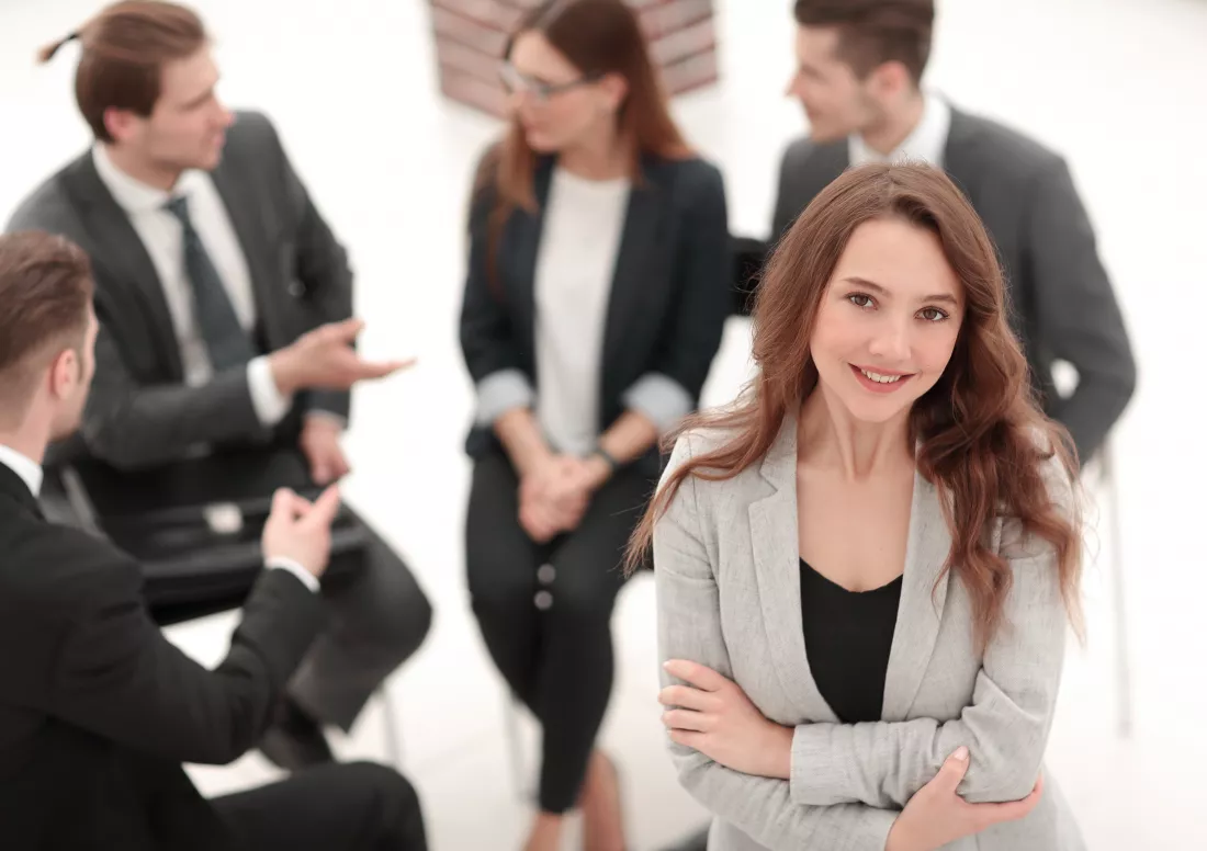 business-woman-with-her-staff-people-group-background-modern-bright-office-indoors