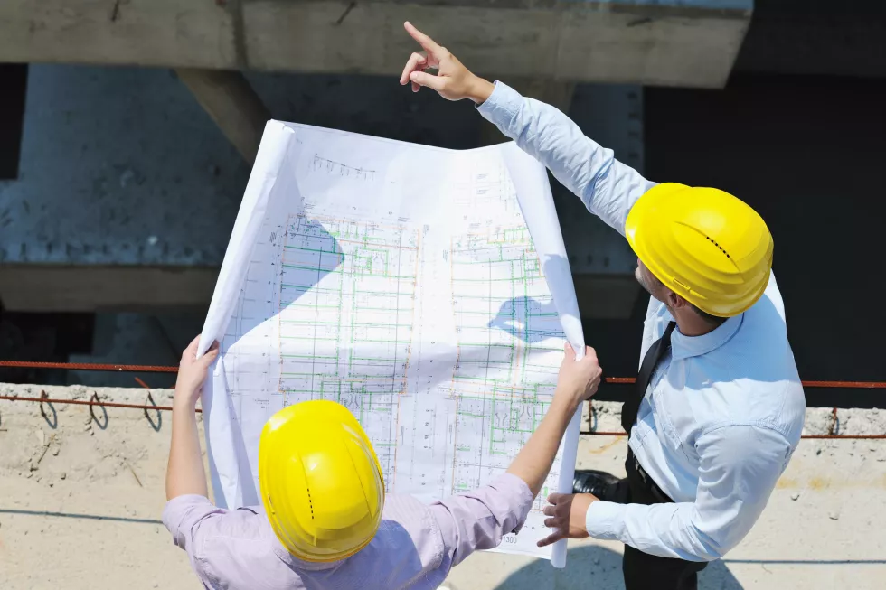 team-architects-people-group-construciton-site-check-documents-business-workflow