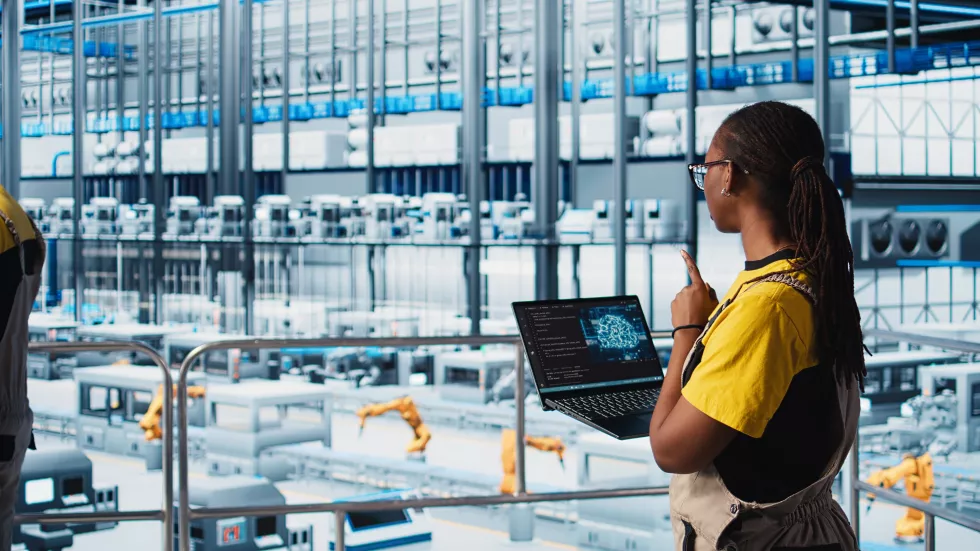 engineer-smart-factory-using-augmented-reality-collect-data-laptop