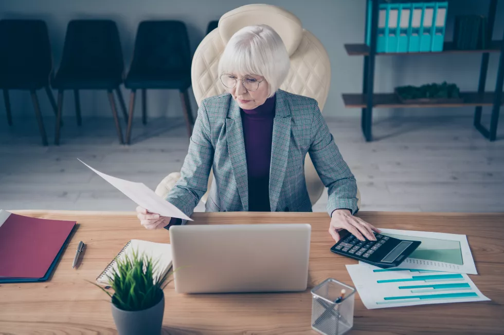 business-lady-desk-working-her-laptop