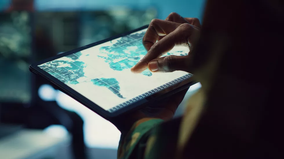 military-it-professional-gathers-intelligence-from-world-map-projection