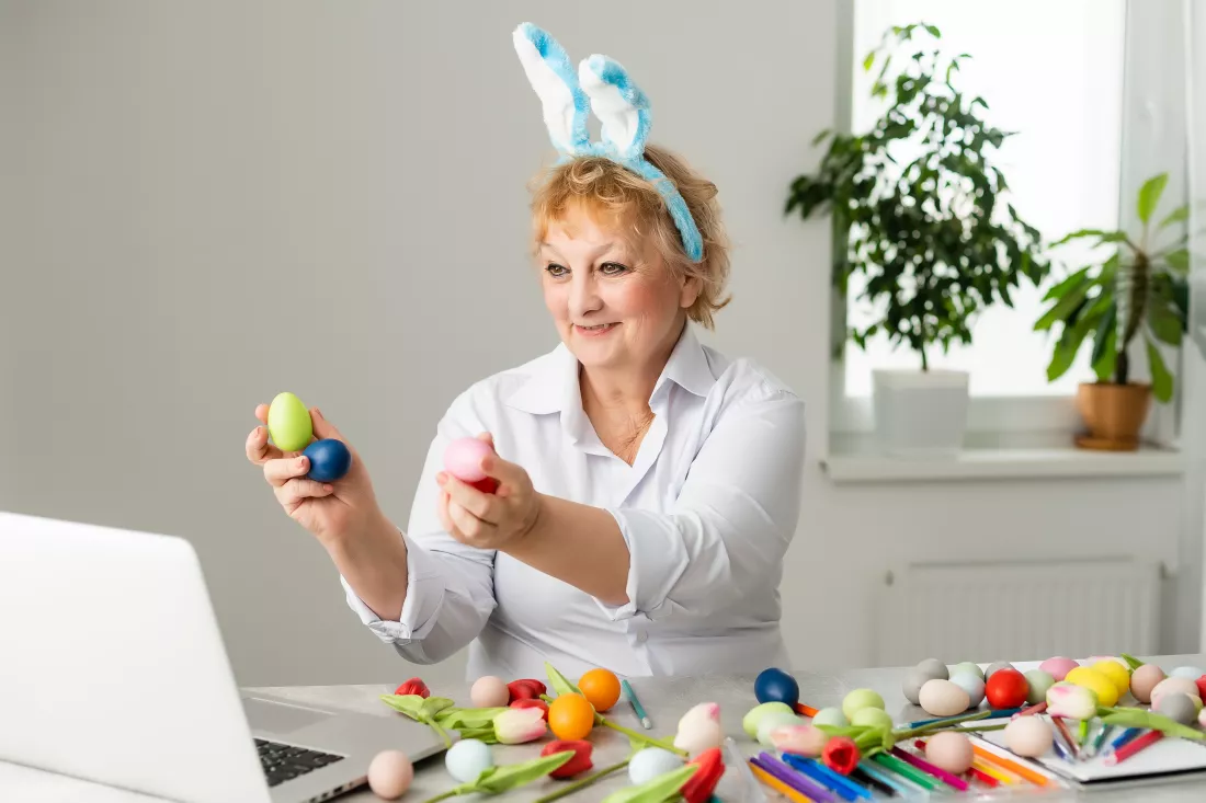 elderly-woman-pains-easter-egg-yellow-colour-family-preparing-easter-close-up-hands-with-egg