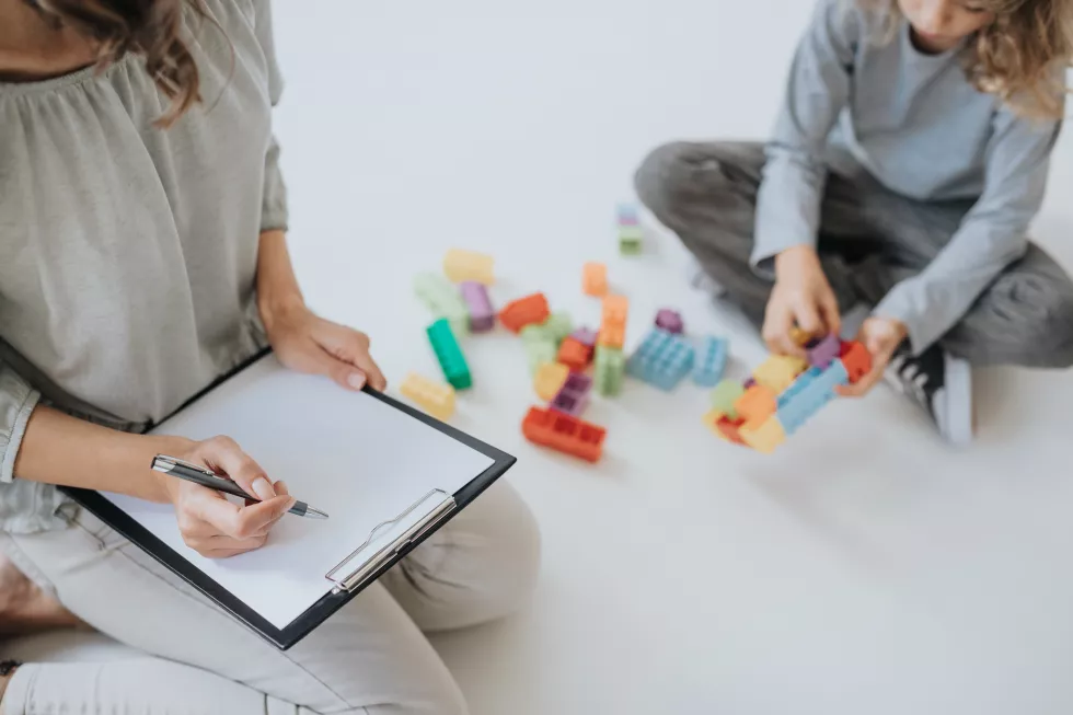 therapist-doing-notes