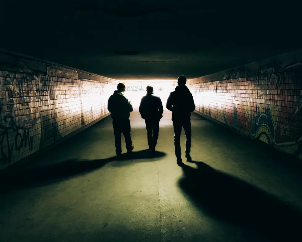 rear-view-silhouette-people-walking-subway