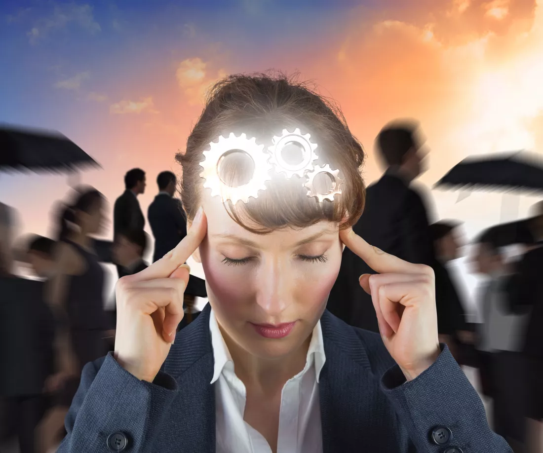 stressed-businesswoman-against-blue-orange-sky