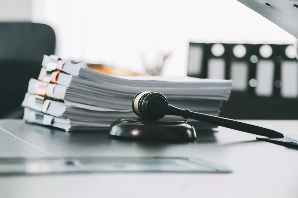 business-lawyers-discussing-contract-papers-with-brass-scale-desk-office-law-legal-services-advice-justice-law-concept-picture-with-film-grain-effect(6)