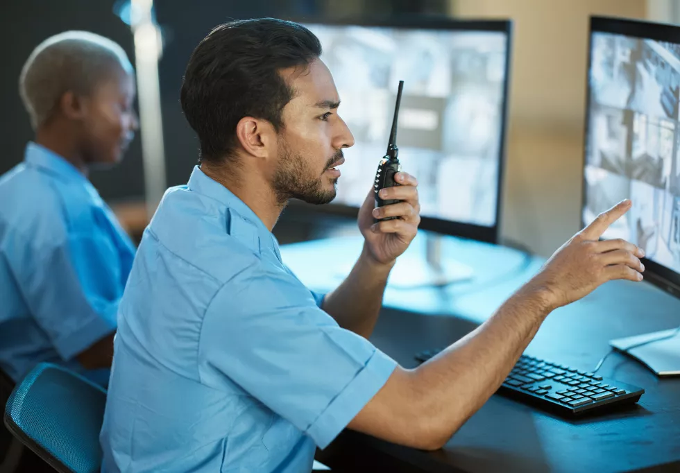 control-room-safety-security-guard-with-radio-computer-screen-surveillance-man-woman-team-together-crime-investigation-cctv-monitor-communication-with-walkie-talkie