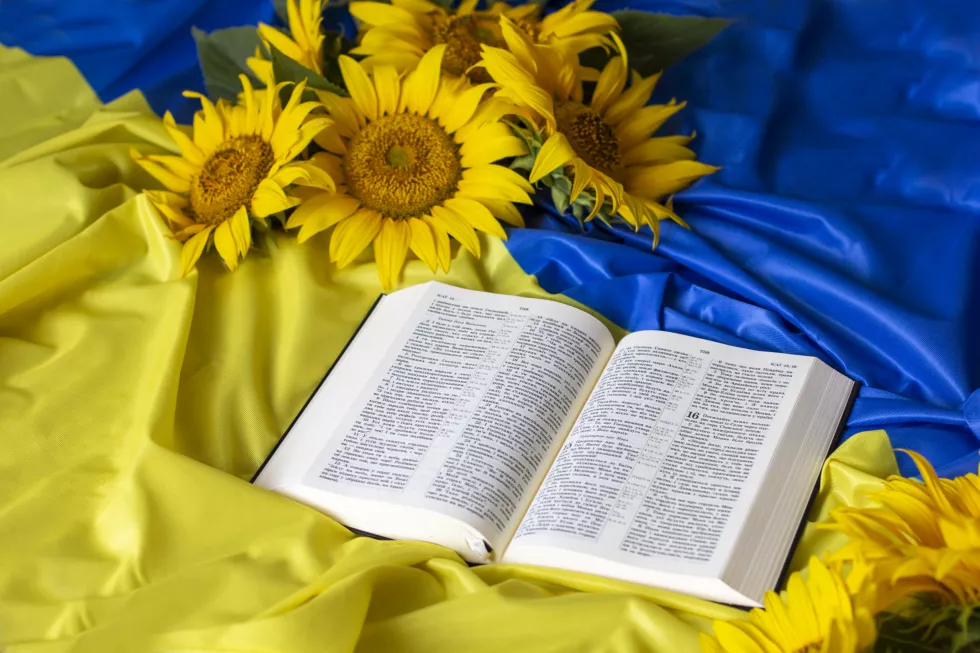 bible-holy-writ-sunflowers-background-flag-ukraine