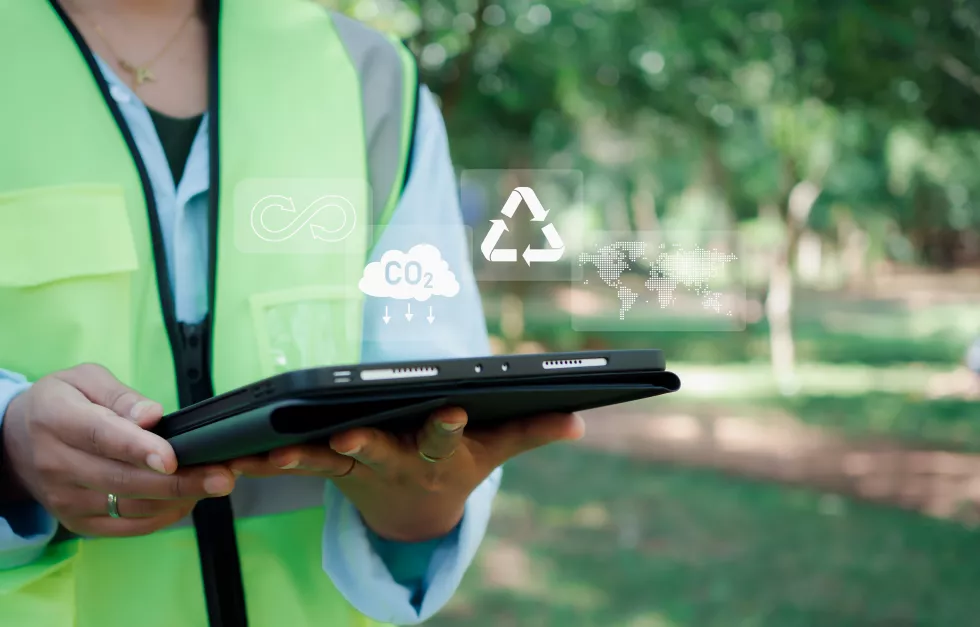 woman-engineer-wearing-safety-helmet-his-head-check-weather-conditions-nature-environment-ready-use-technology-work-with-digital-renewable-woman-engineer-show-esg-icon