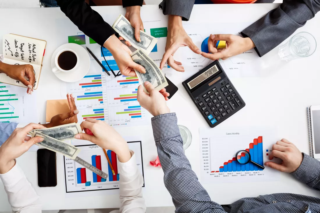 businessmen-hands-white-table-with-documents-drafts