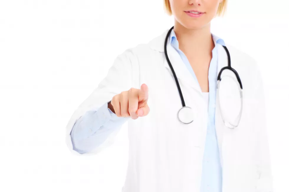 young-doctor-pressing-screen-white-background