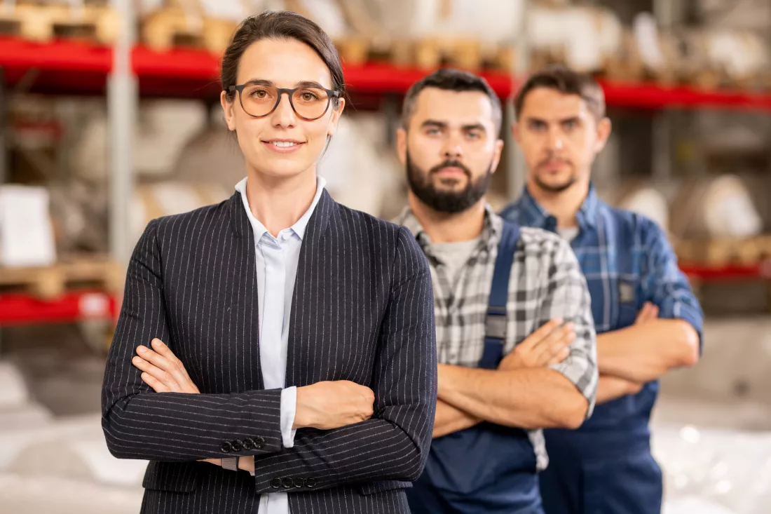 young-confident-leader-team-standing-front-two-workers-contemporary-chemical-production-factory