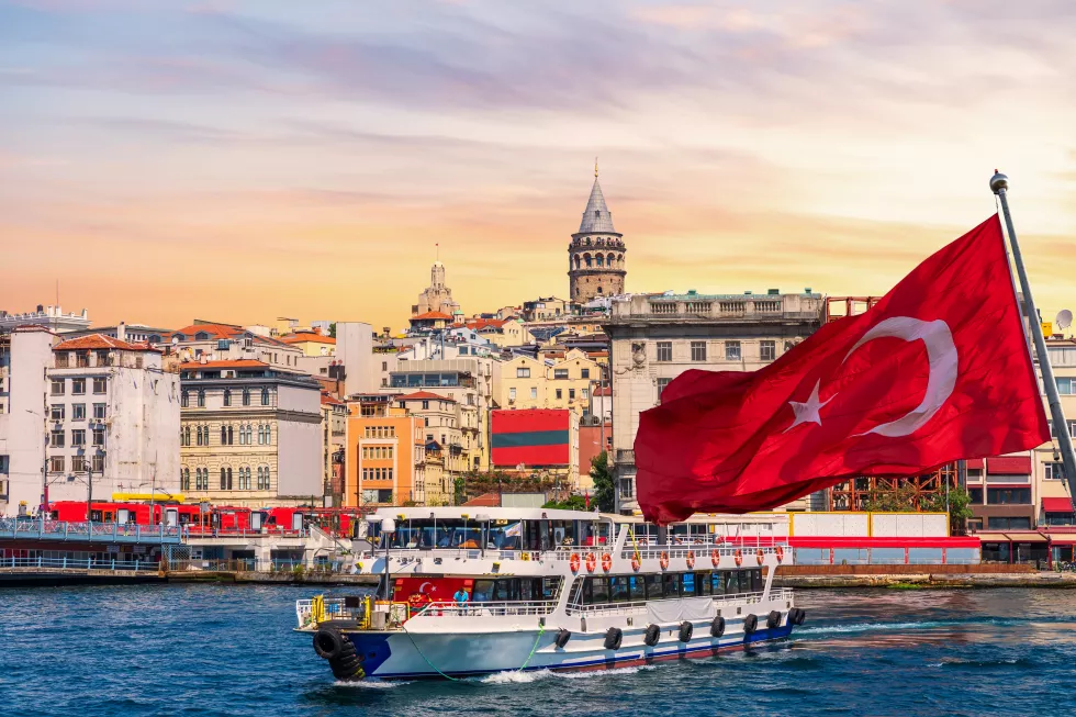 karakoy-pier-ferry-turkish-flag-galata-tower-background-istanbul-turkey
