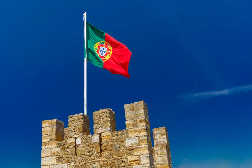 portuguese-flag-fortress-wall-lisbon-portugal