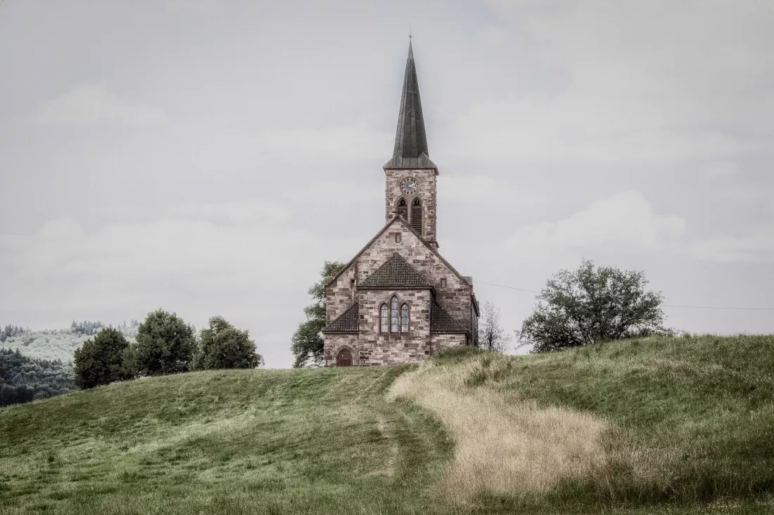 traditional-building-field-against-sky