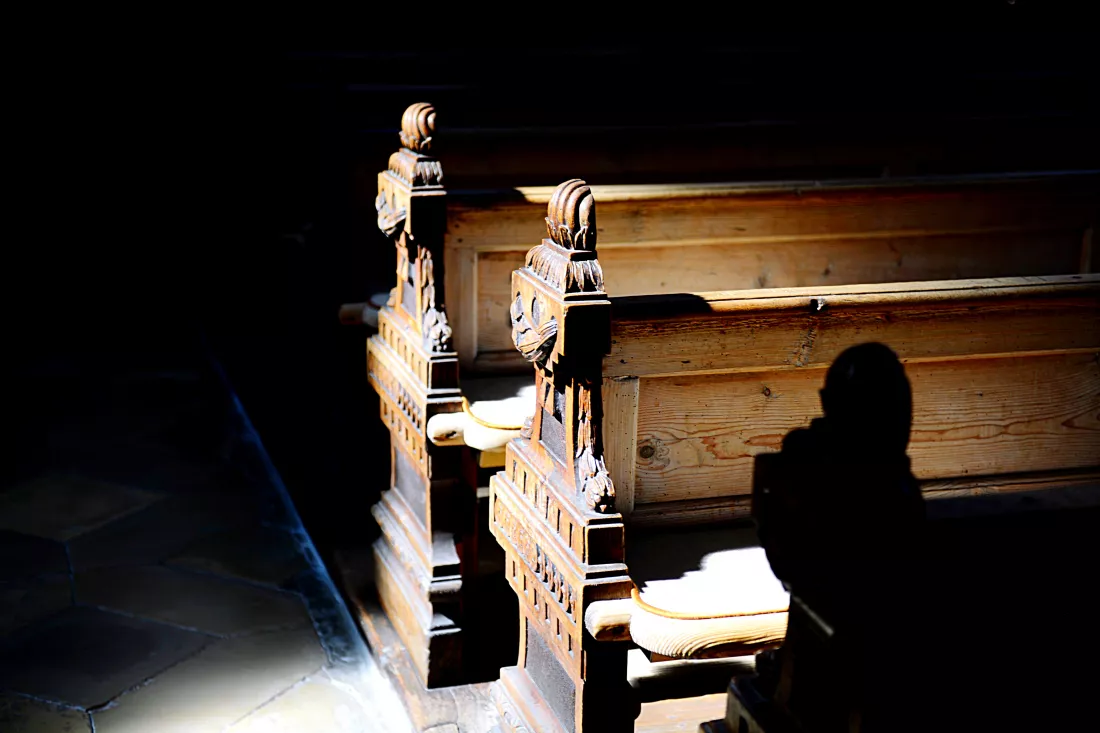 silhouette-man-sitting-staircase-building