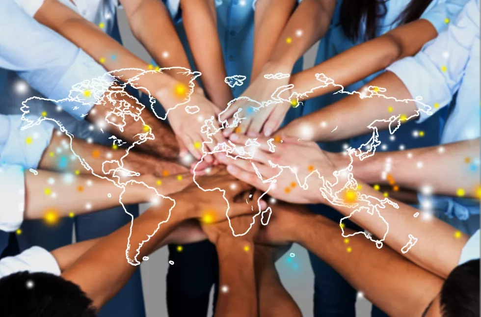 handshake-many-young-business-people-teamwork-concept