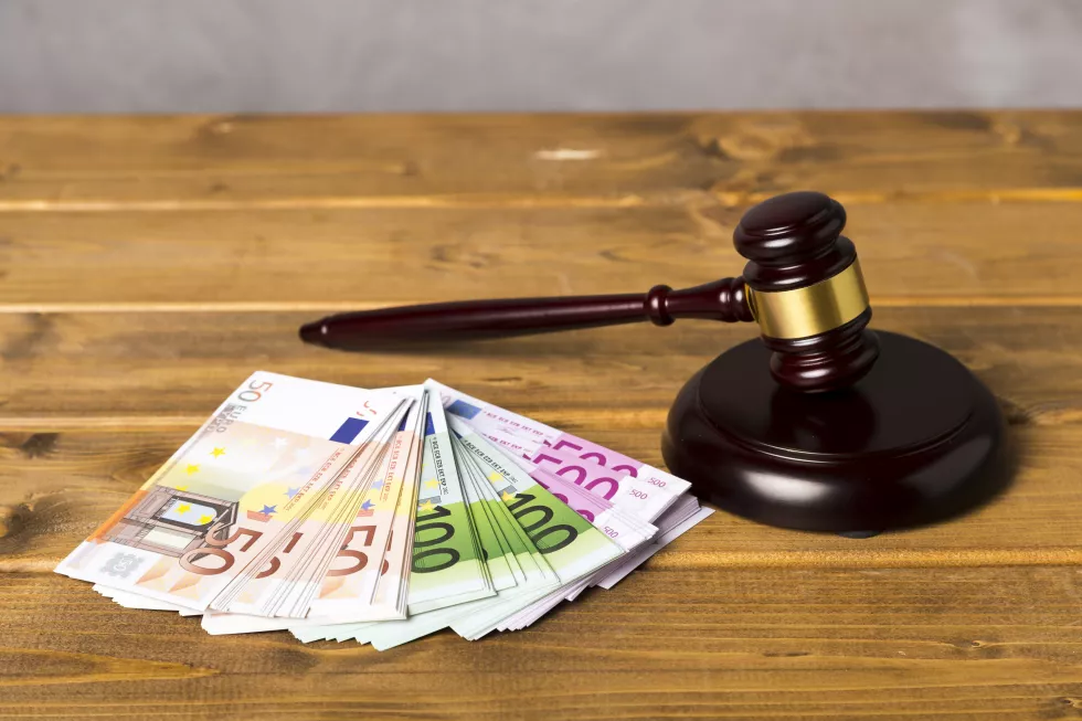 high-angle-judge-gavel-with-euro-banknotes