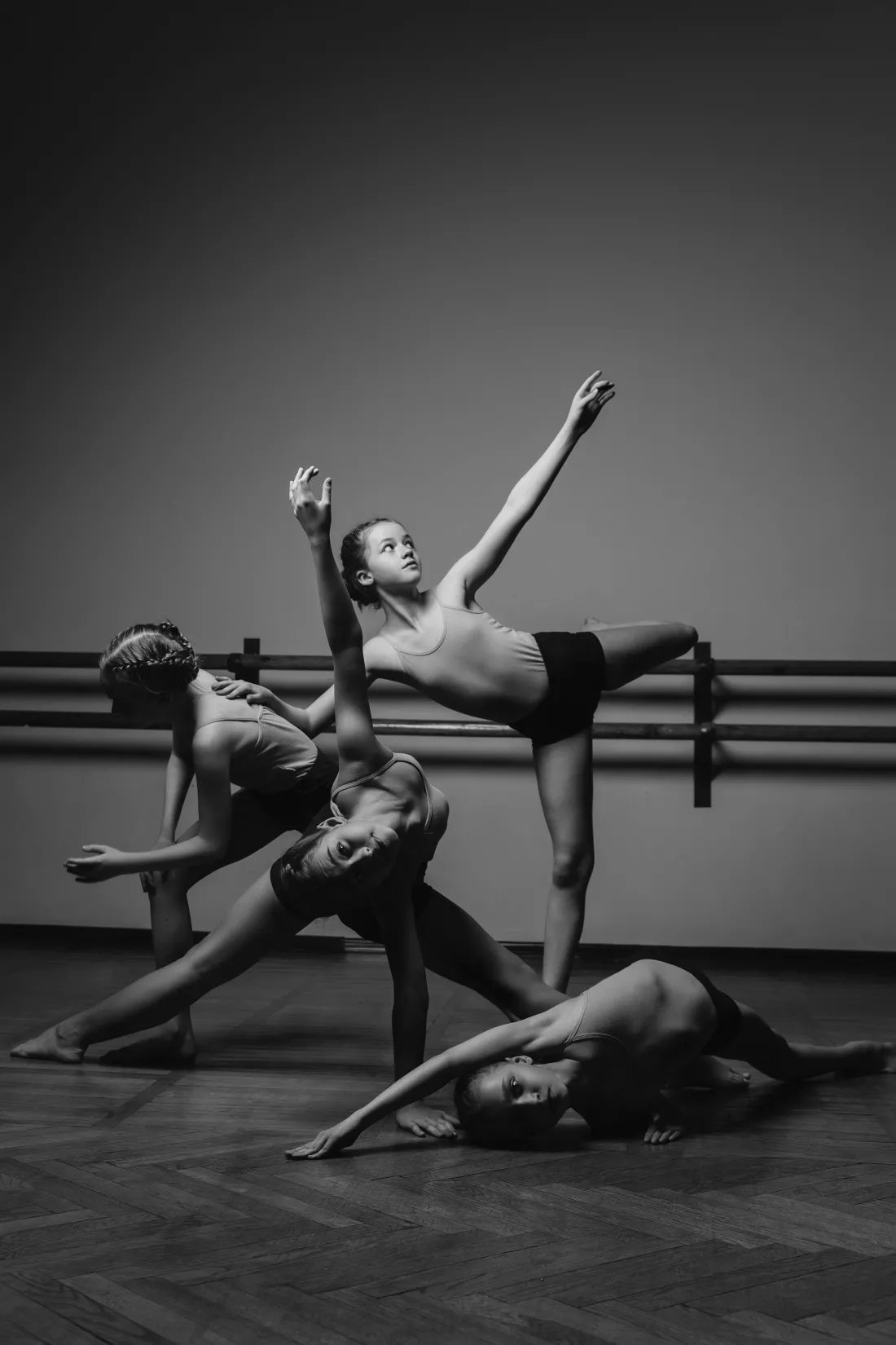 black-white-image-group-modern-little-ballerinas-standing-modern-dance-pose