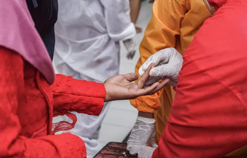 take-blood-sample-rapid-test