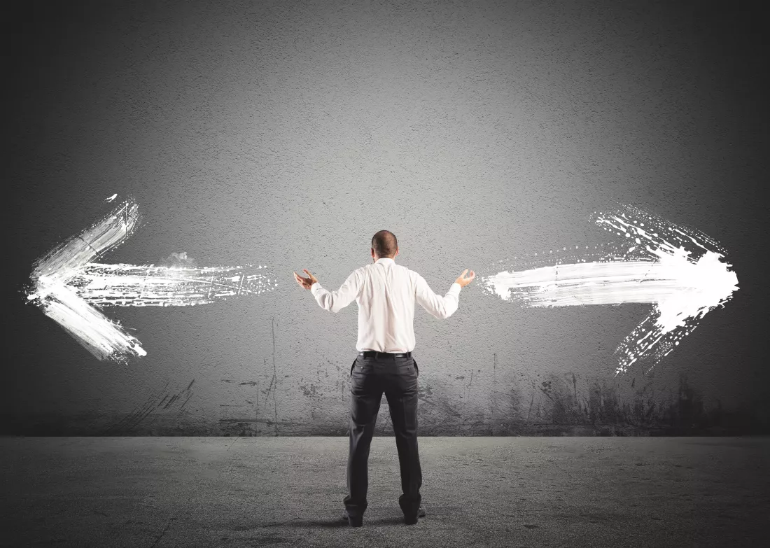 businessman-front-choice-with-arrows-opposite-directions