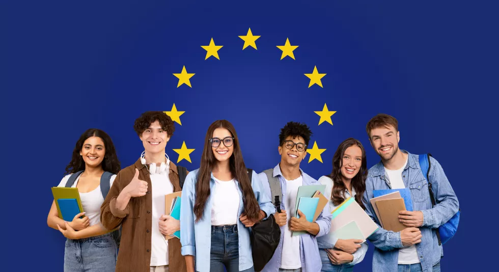 joyful-multiethnic-group-five-college-students-with-books-backpacks-standing(1)