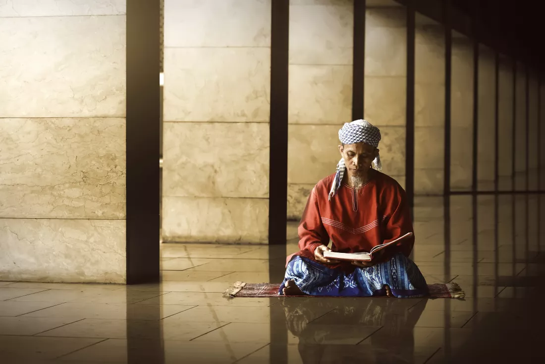 religious-muslim-man-reading-holy-koran