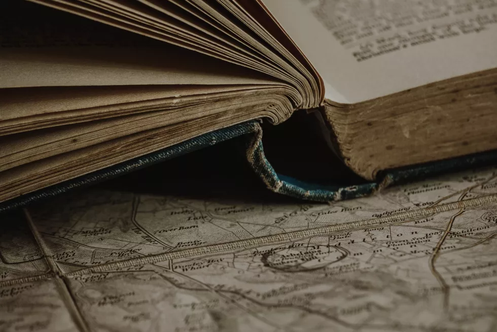 book-is-open-page-with-map-world-it