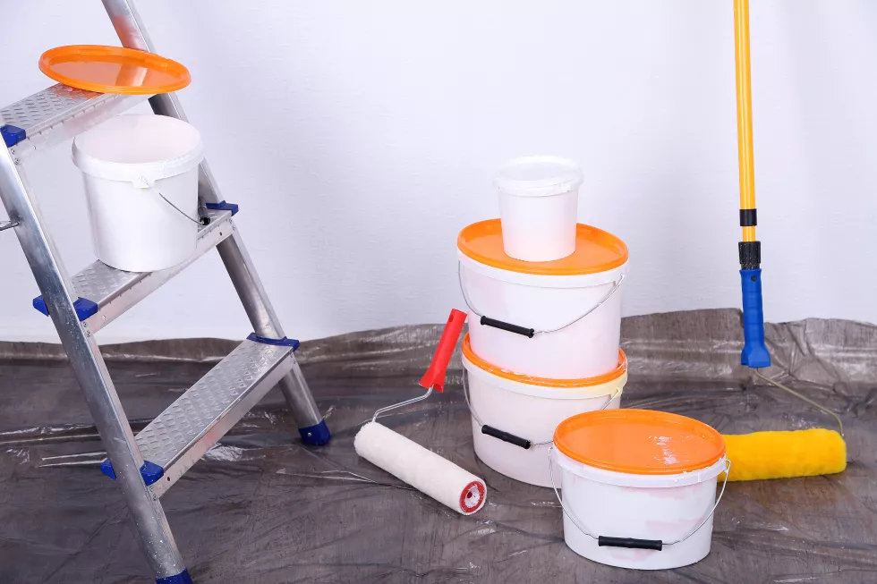 buckets-with-paint-ladder-wall-background-conceptual-photo-repairing-works-room