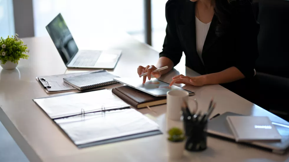 midsection-woman-working-table