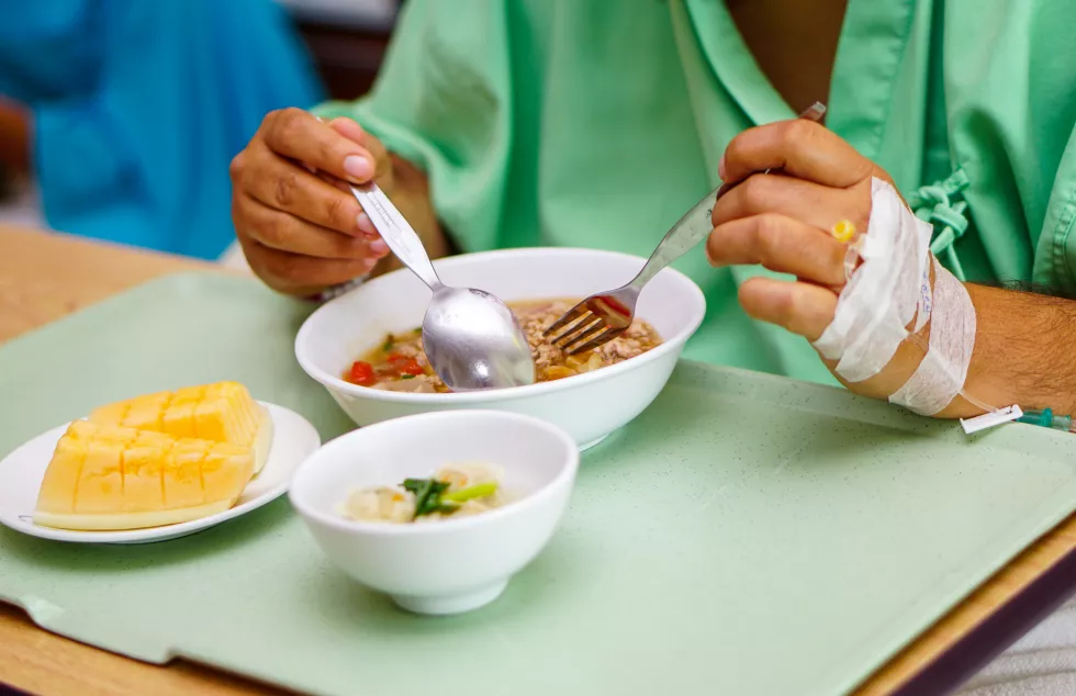 midsection-woman-with-food-table