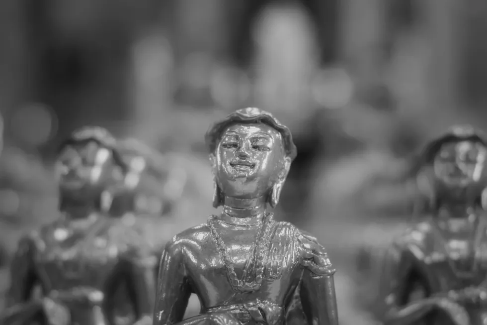 close-up-buddha-statue-against-blurred-background
