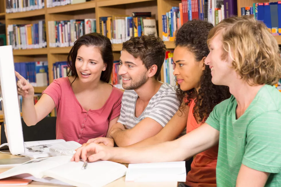 college-students-using-computer-library