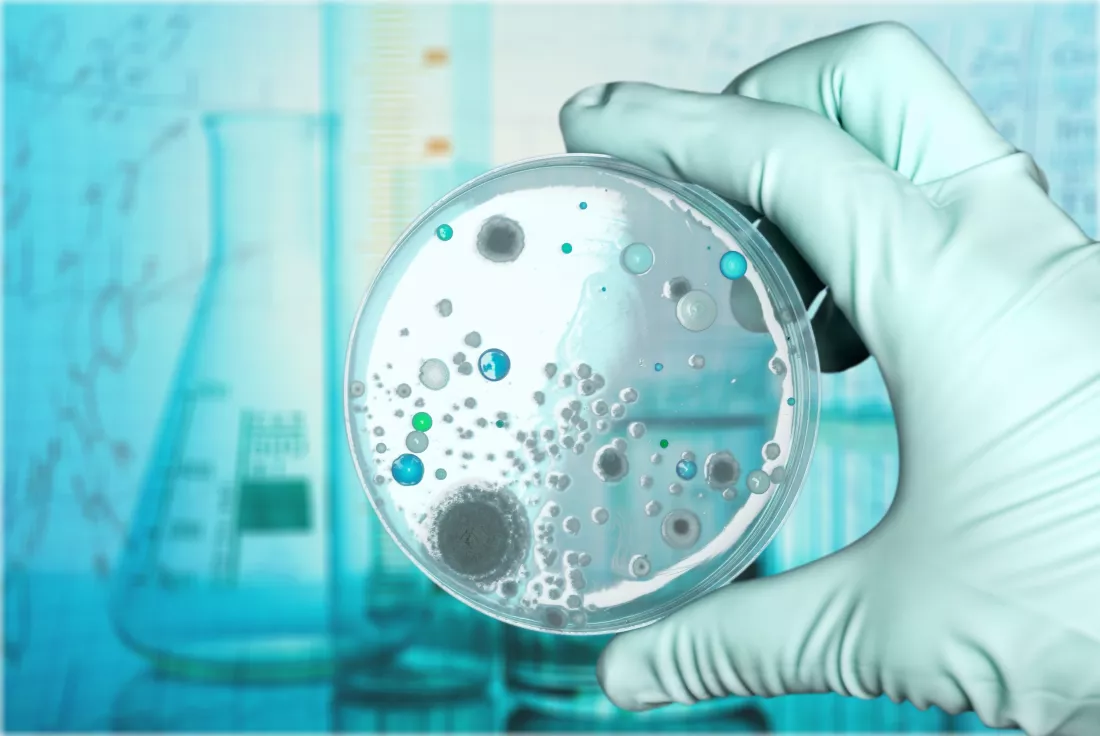 microbiology-laboratory-test-scientist-hand-background