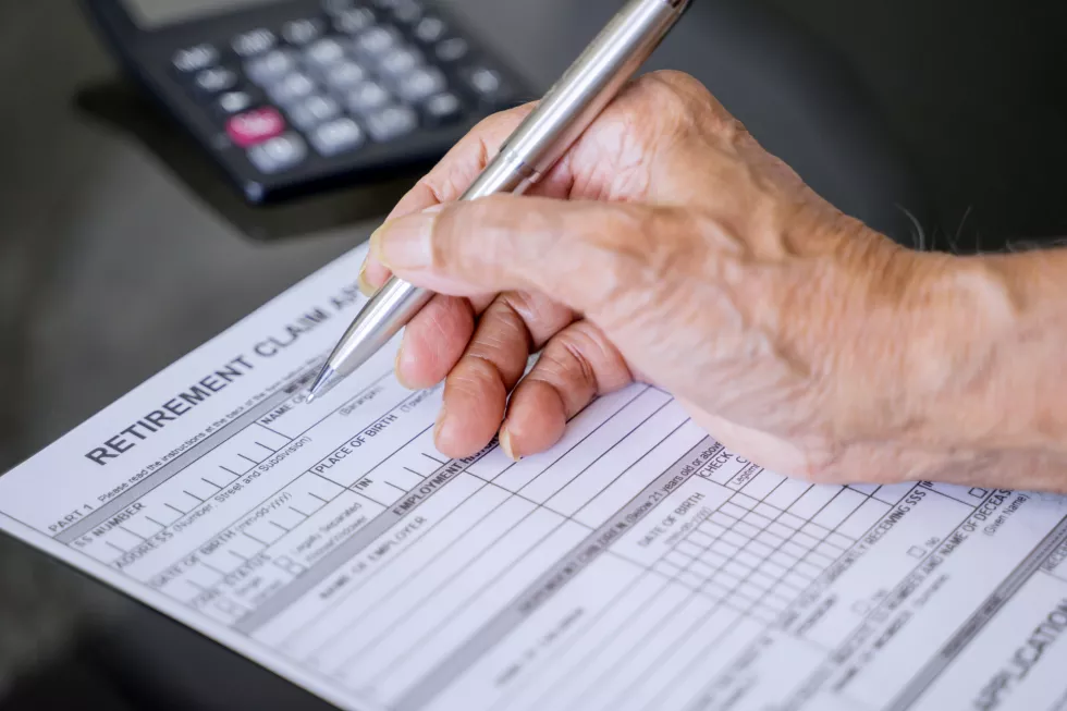 high-angle-view-man-using-smart-phone-table