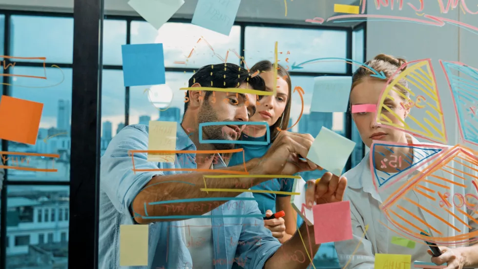 group-business-team-working-together-discussing-glass-wall-tracery