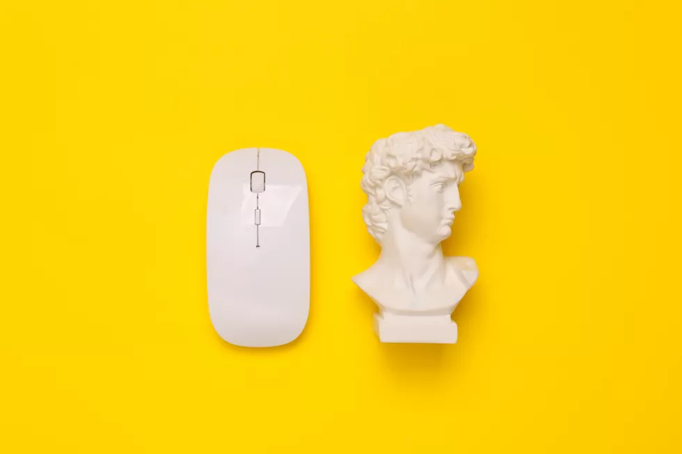 minimal-still-life-antique-david-bust-with-pc-mouse-yellow-background