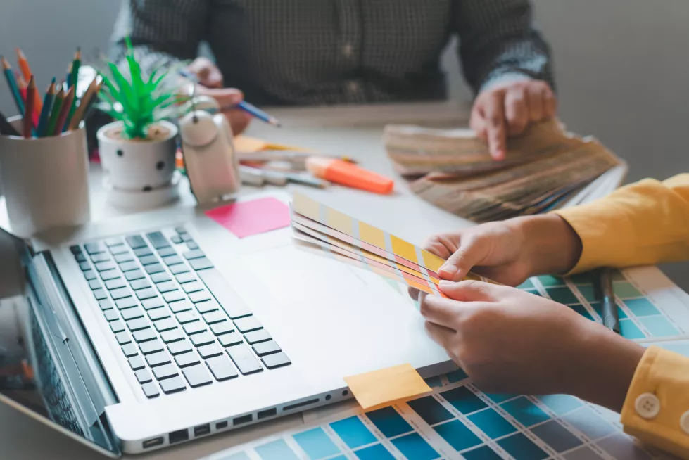 graphic-designer-creative-team-is-currently-working-design-color-selection-guide-color-advertising-design