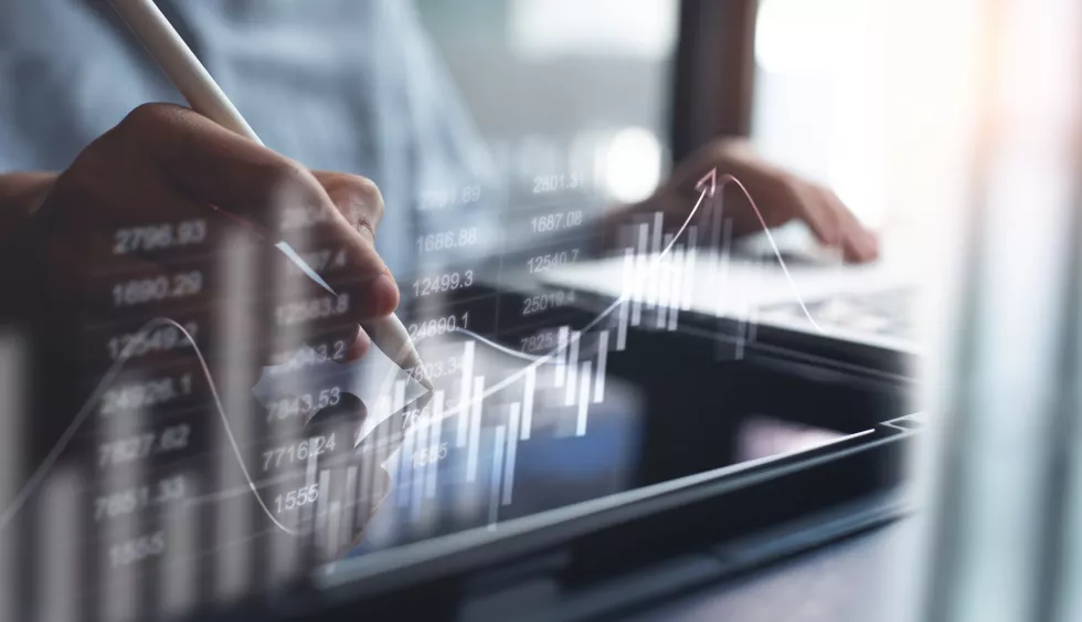 businessman-using-digital-tablet-analyzing-sales-data-economic-growth-graph-chart-business-strategy-planning-marketing-report-business-development-concept