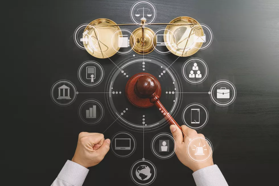 justice-law-conceptt-op-view-male-judge-hand-courtroom-with-gavel-brass-scale