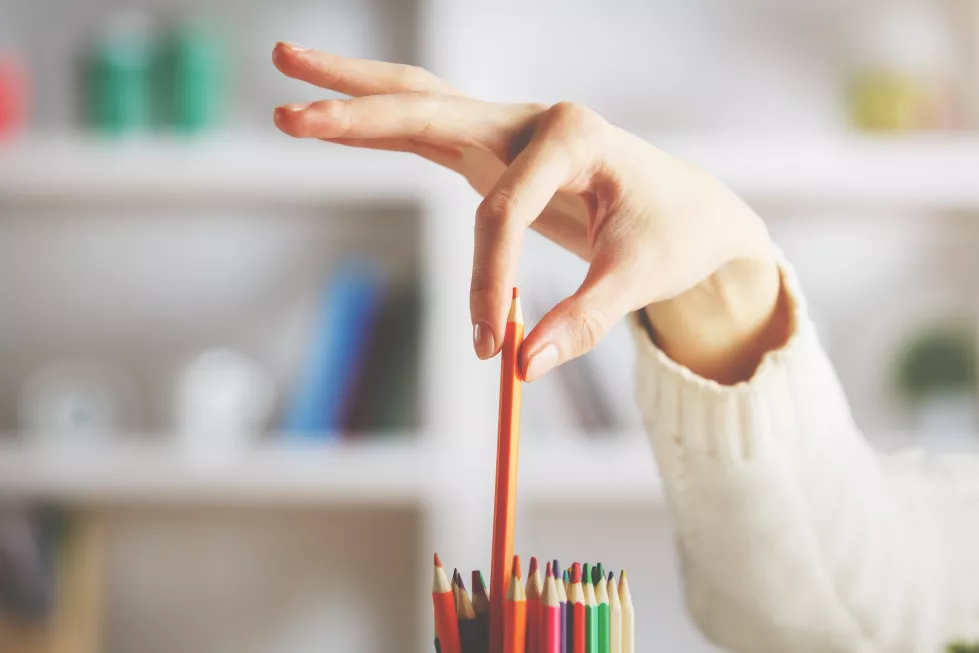 girl-taking-red-pencil