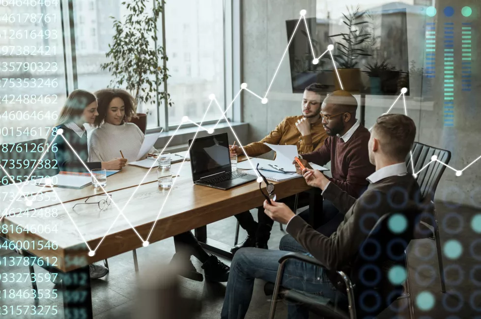 full-shot-business-people-sitting-table