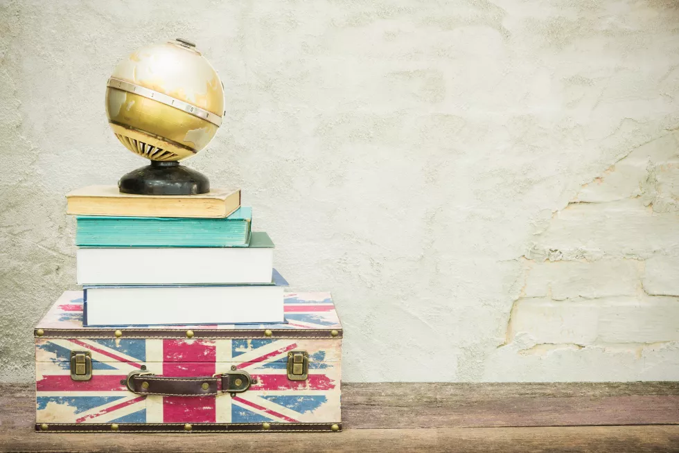 stack-books-table-against-wall
