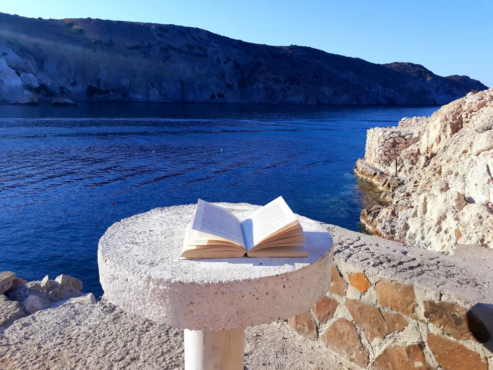 book-table-seafront-milos-greece-september-2019