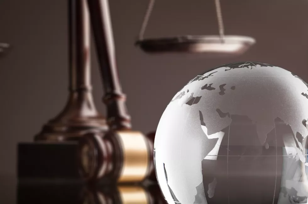 international-law-concept-world-globe-scales(1)